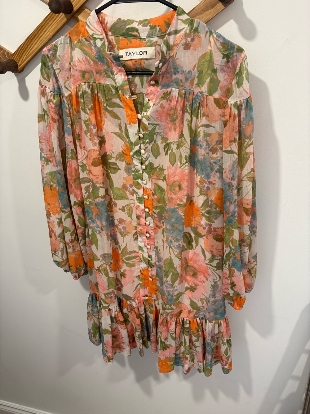 Taylor brand mini dress features a vibrant floral print and flowy bishop sleeves - Picture 1 of 8